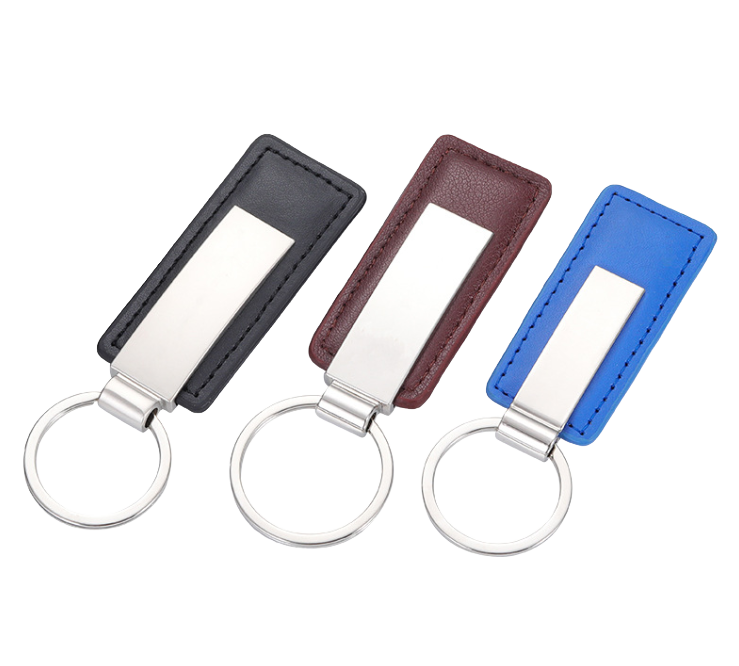 Three promotional leather keychains in black burgundy and blue with brushed silver engravable plates and split rings
